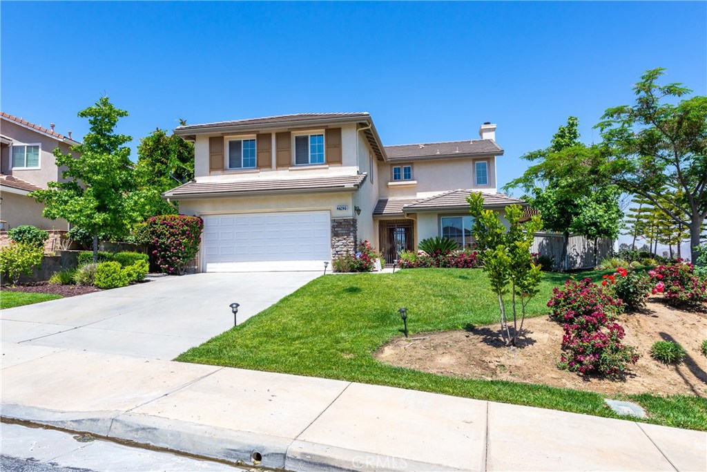 27431 Pacos Ridge Corona, CA 92883 - Photo 1 of 1 a front view of a house with a yard