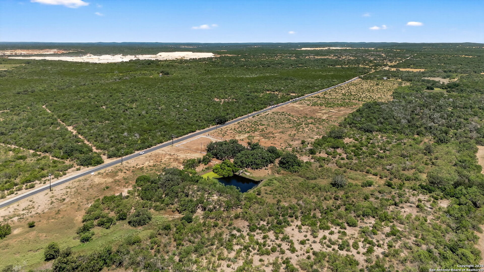 281 County Road 265 Mico, TX 78056 - Photo 13 of 28 a view of a lake from a balcony