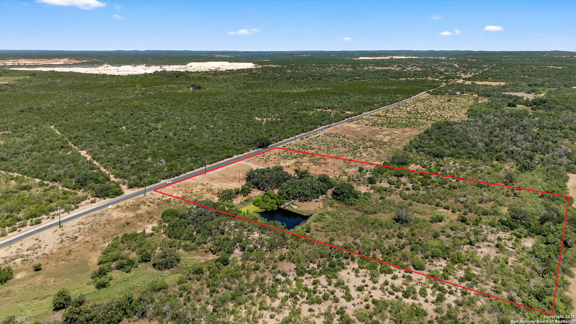 281 County Road 265 Mico, TX 78056 - Photo 17 of 28 a view of a lake from a balcony