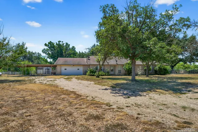 a house view with a outdoor space
