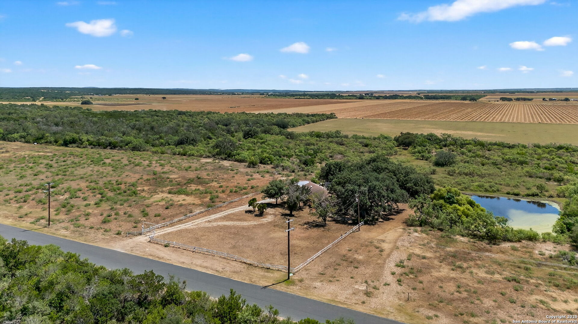 281 County Road 265 Mico, TX 78056 - Photo 8 of 28 a view of a lake with a yard