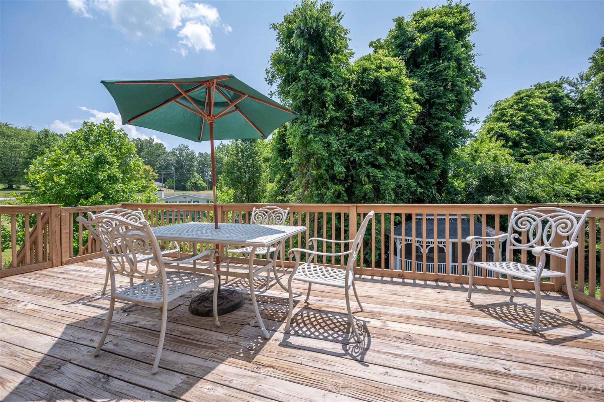 980 Brookside Camp Road Hendersonville, NC 28792 - Photo 14 of 47 a view of a chairs and table on the wooden floor