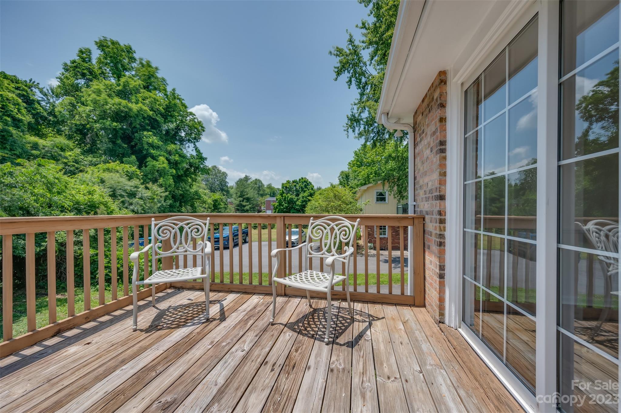 980 Brookside Camp Road Hendersonville, NC 28792 - Photo 16 of 47 a view of balcony with wooden floor and fence
