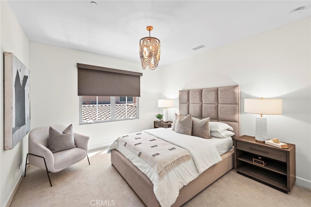 22 Tesoro Irvine, CA 92618 - Photo 14 of 27 a bedroom with a bed and a window
