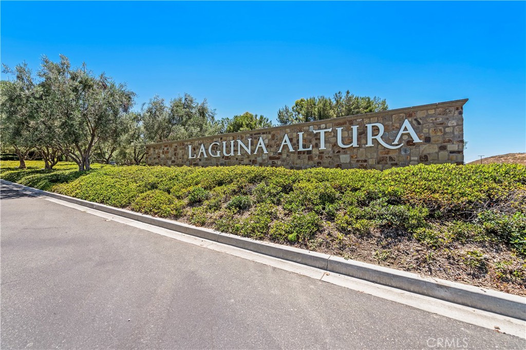 22 Tesoro Irvine, CA 92618 - Photo 19 of 27 a view of a sign board with street and sign board