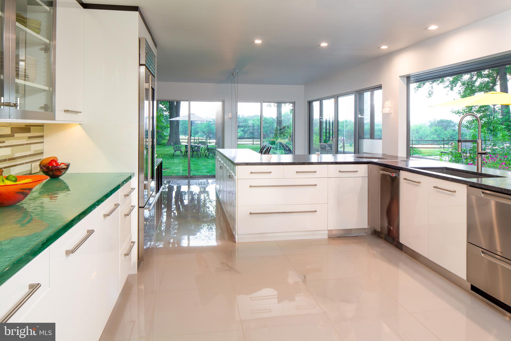35 Raven Rock Rosemont Road Stockton, NJ 08559 - Photo 16 of 61 a kitchen with a large window and counter top