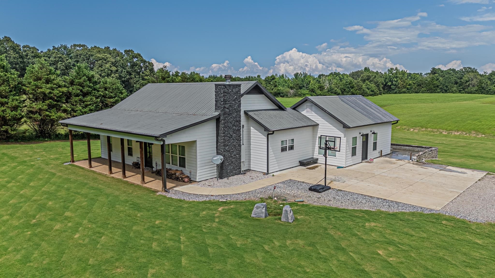50 Shady Grove Road Williston, TN 38076 - Photo 2 of 35 a aerial view of a house with garden and a sitting area