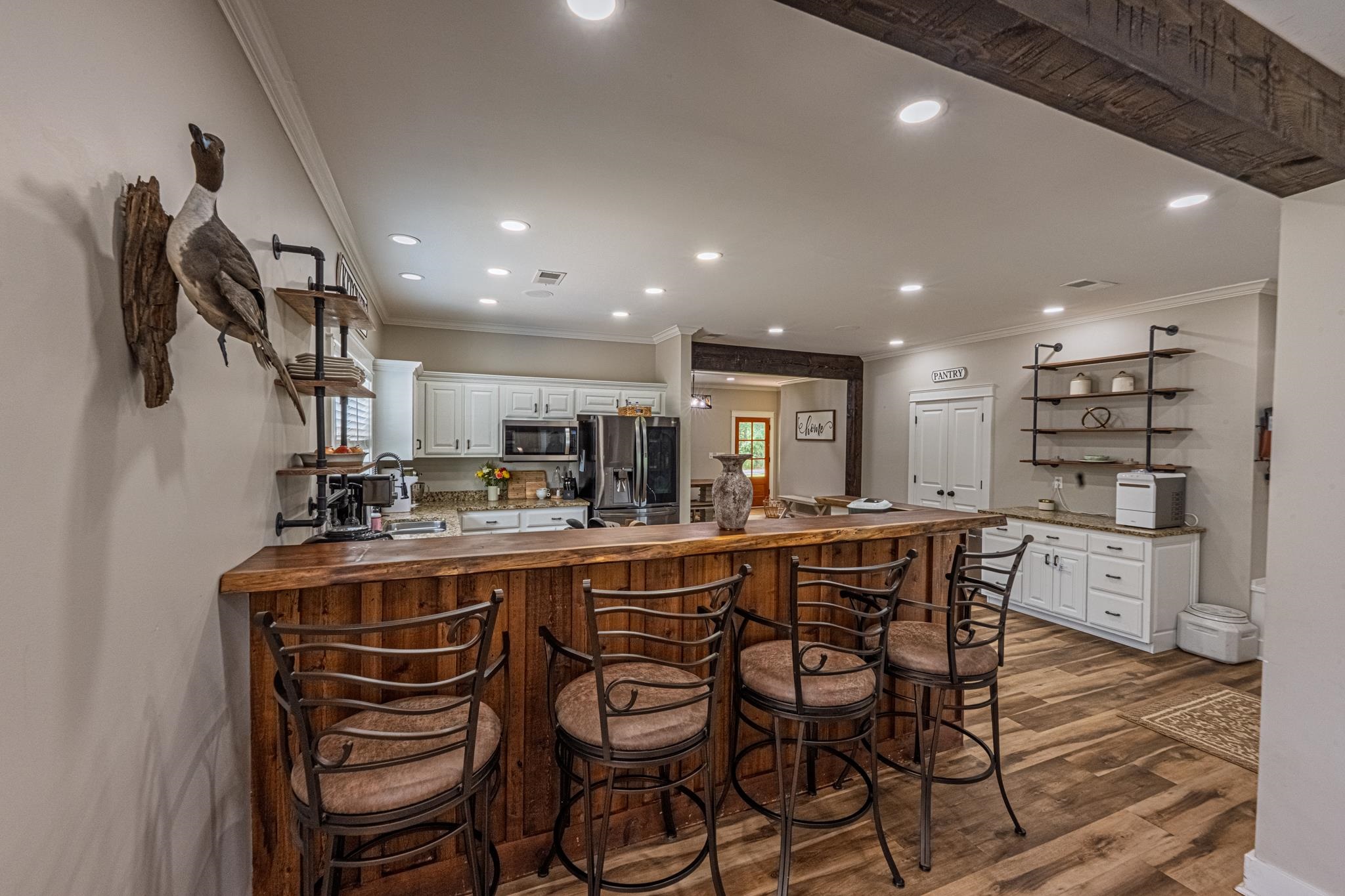 50 Shady Grove Road Williston, TN 38076 - Photo 23 of 35 a kitchen with a table and chairs in it
