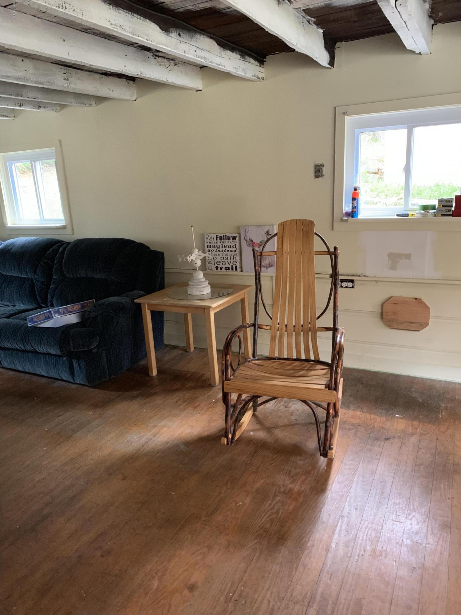 31 Lower Rainbow Road Otis, MA 01029 - Photo 5 of 15 a view of a workspace with furniture and a window
