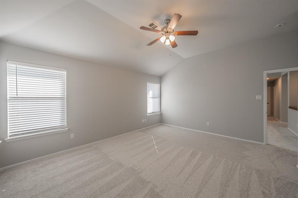 7305 Raintree Way Denton, TX 76210 - Photo 19 of 32 a view of an empty room with a window