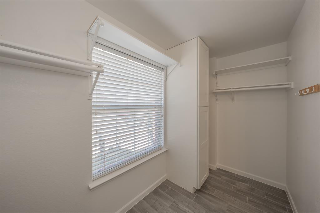 7305 Raintree Way Denton, TX 76210 - Photo 21 of 32 a view of a room that has a window in it