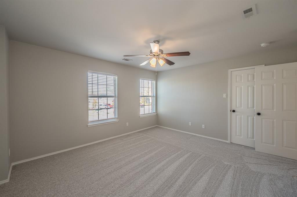 7305 Raintree Way Denton, TX 76210 - Photo 27 of 32 a view of an empty room with a window