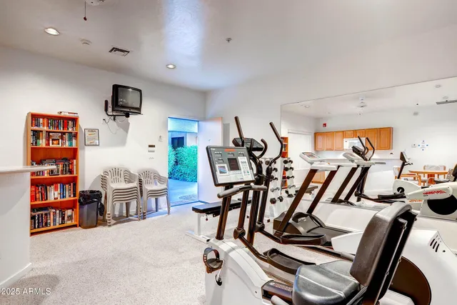 a view of a room with gym equipment
