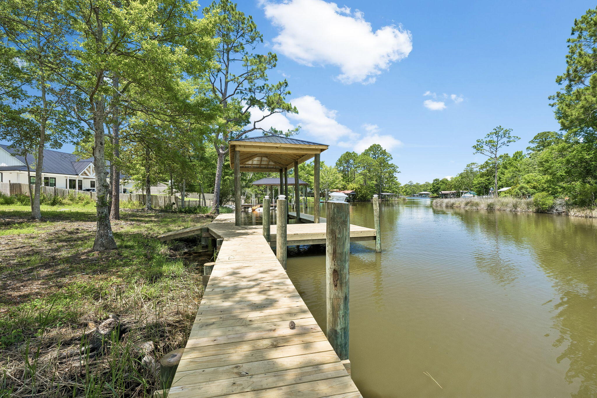 92 Waterside Lane Freeport, FL 32439 - Photo 1 of 28 a view of a lake with houses