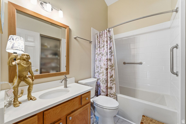 7930 Mustang Loop Road Park City, UT 84098 - Photo 15 of 23 Bathroom featuring vanity and shower / bathtub combination with curtain
