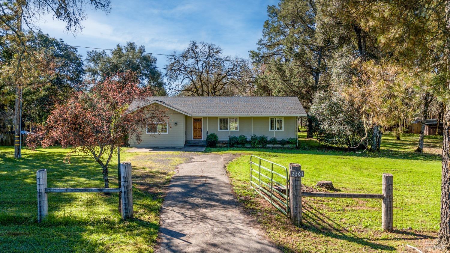 2301 Rd H Redwood Valley, CA 95470 - Photo 1 of 1 a front view of a house with swimming pool having outdoor seating