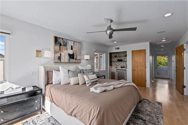 a terrace with outdoor seating and city view