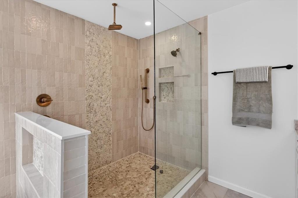 16145 Henderson Road Alpharetta, GA 30004 - Photo 35 of 61 a bathroom with a shower