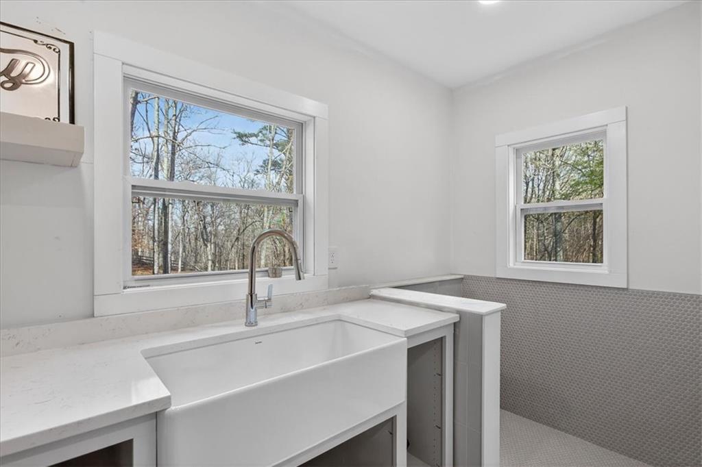 16145 Henderson Road Alpharetta, GA 30004 - Photo 41 of 61 a close view of sink and tap