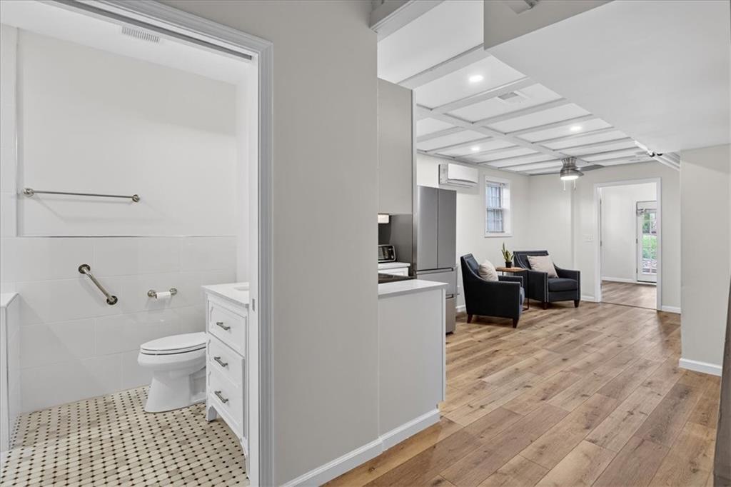 16145 Henderson Road Alpharetta, GA 30004 - Photo 42 of 61 a bathroom with a sink double vanity and a toilet