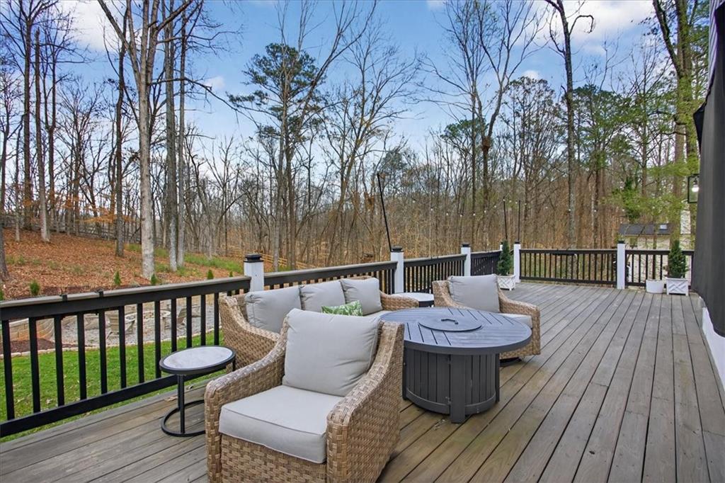 16145 Henderson Road Alpharetta, GA 30004 - Photo 49 of 61 a view of a deck with furniture