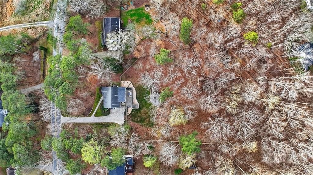 16145 Henderson Road Alpharetta, GA 30004 - Photo 58 of 61 an aerial view of a house with a yard and outdoor space
