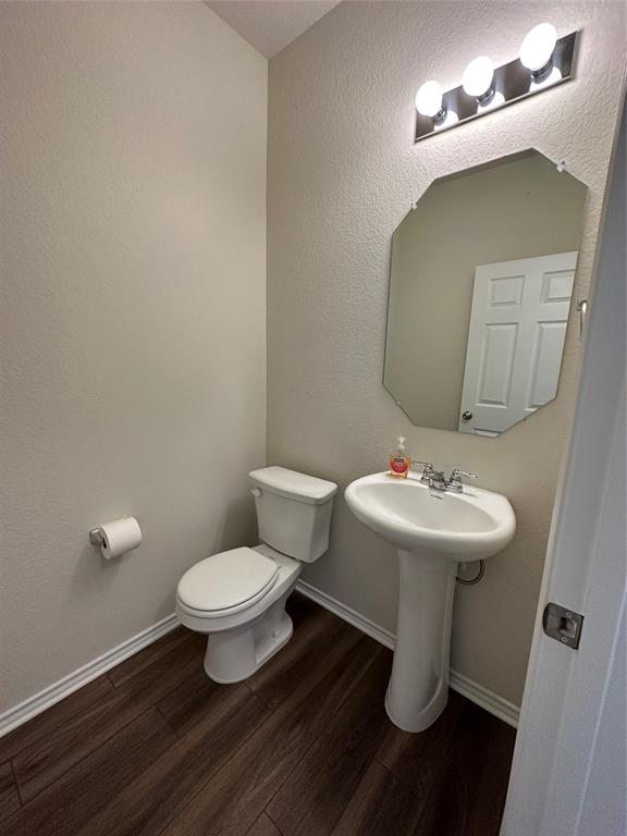 148 Prairie Falcon Way Leander, TX 78641 - Photo 12 of 19 a bathroom with a sink and a mirror