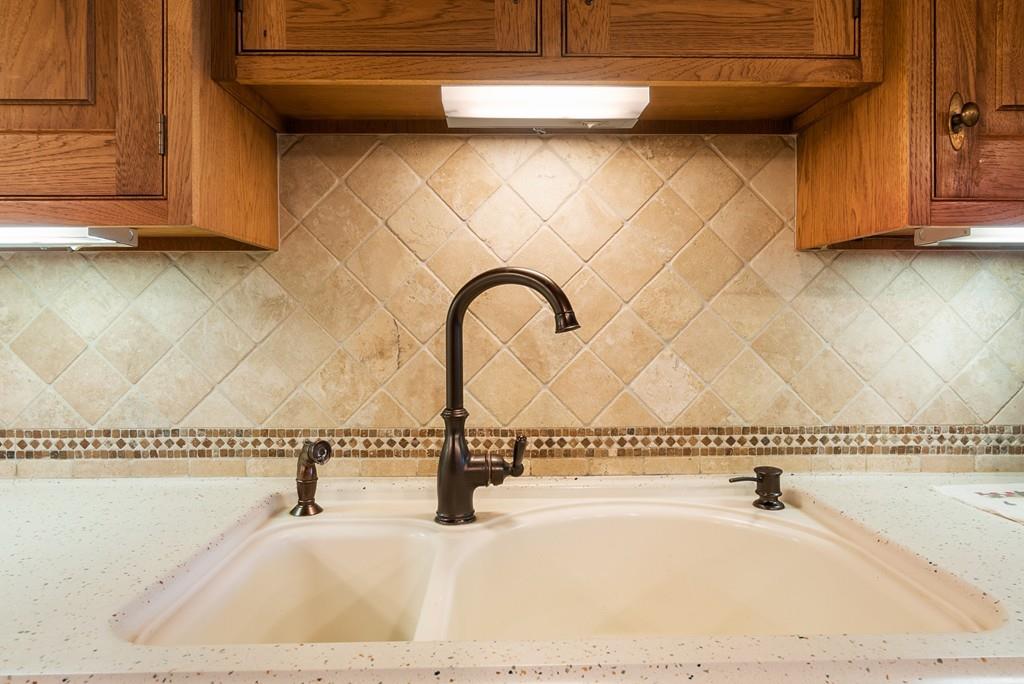 24 Ridge Trail Douglas, MA 01516 - Photo 12 of 36 a close view of a sink and a tap