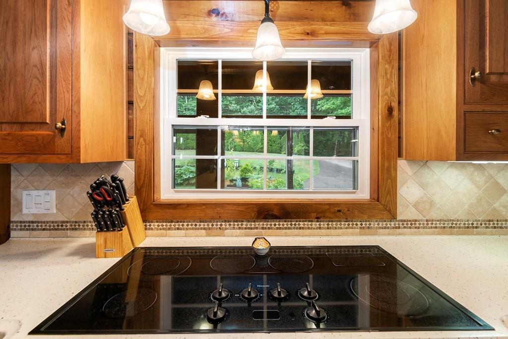 24 Ridge Trail Douglas, MA 01516 - Photo 13 of 36 a kitchen with a sink and a window