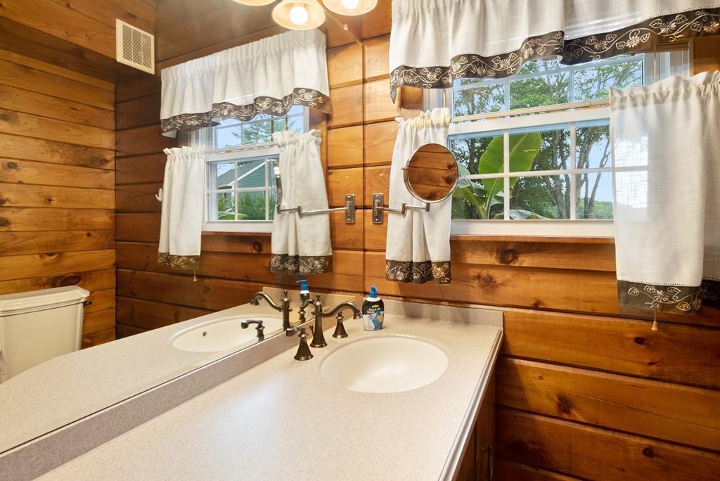 24 Ridge Trail Douglas, MA 01516 - Photo 18 of 36 a bathroom with a sink and a window