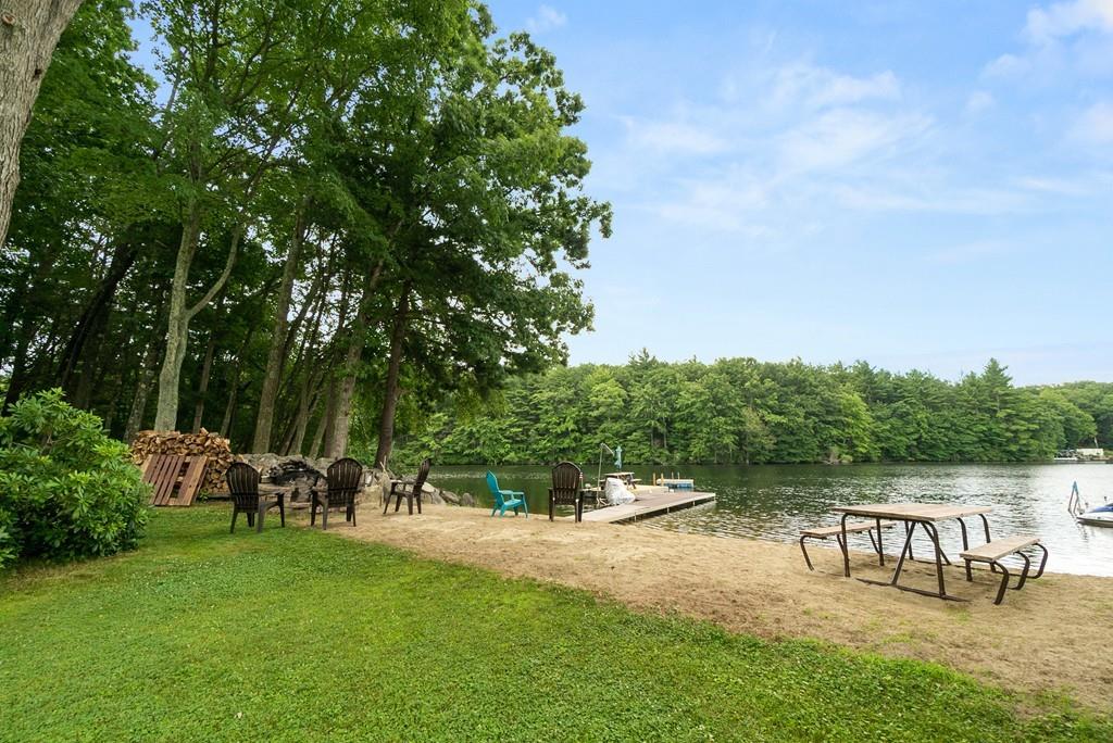 24 Ridge Trail Douglas, MA 01516 - Photo 2 of 36 a view of a lake with outdoor seating