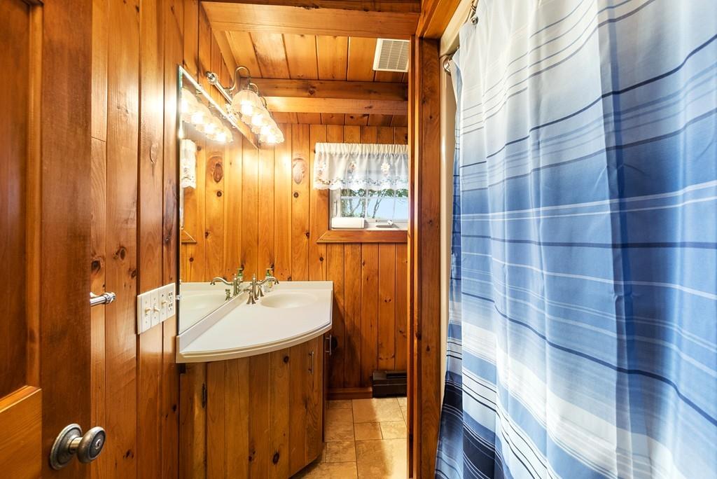 24 Ridge Trail Douglas, MA 01516 - Photo 26 of 36 a bathroom with a sink and a mirror