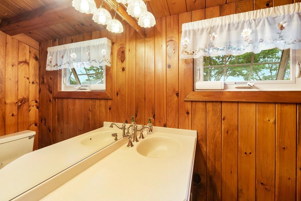 24 Ridge Trail Douglas, MA 01516 - Photo 27 of 36 a bathroom with a sink and a mirror