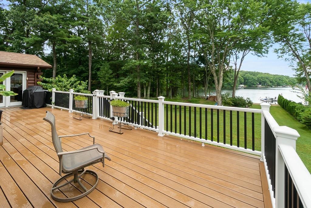 24 Ridge Trail Douglas, MA 01516 - Photo 33 of 36 a view of a patio with a table and chairs
