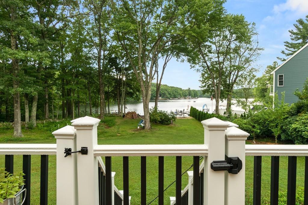 24 Ridge Trail Douglas, MA 01516 - Photo 34 of 36 a view of a house with backyard and trees