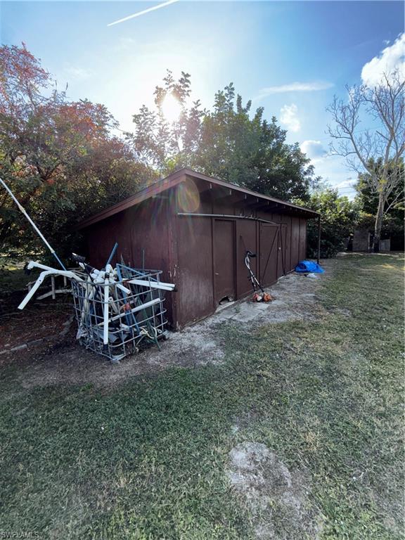 117 Robert Avenue Lehigh Acres, FL 33936 - Photo 17 of 20 View of outbuilding
