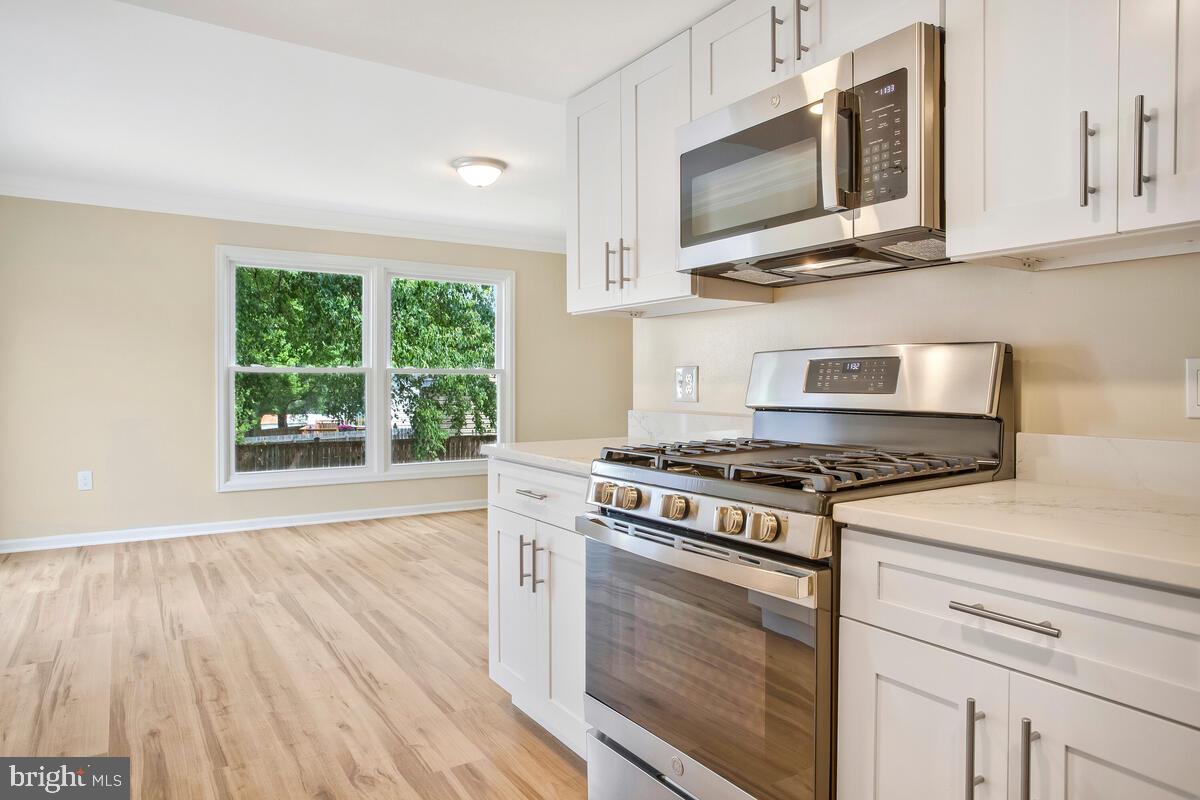 13006 Claxton Drive Laurel, MD 20708 - Photo 11 of 46 Gas Stove & Microwave