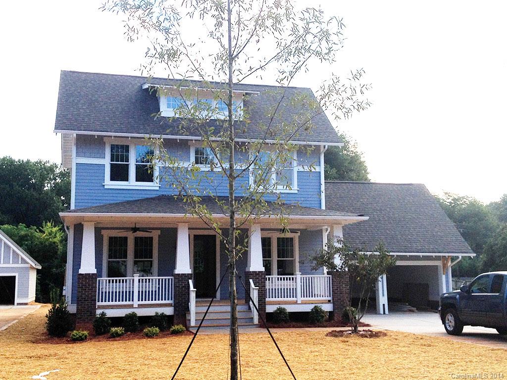 529 Marsh Road Charlotte, NC 28209 - Photo 1 of 13 a front view of a house with a yard