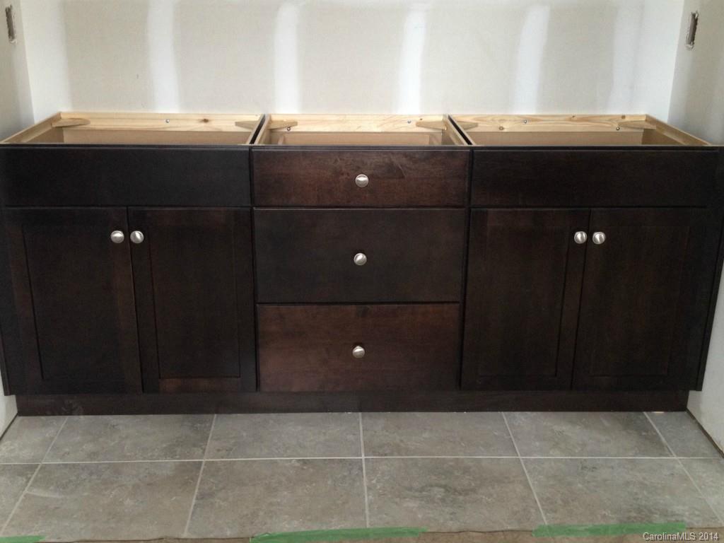 529 Marsh Road Charlotte, NC 28209 - Photo 8 of 13 a room with a sink and cabinets