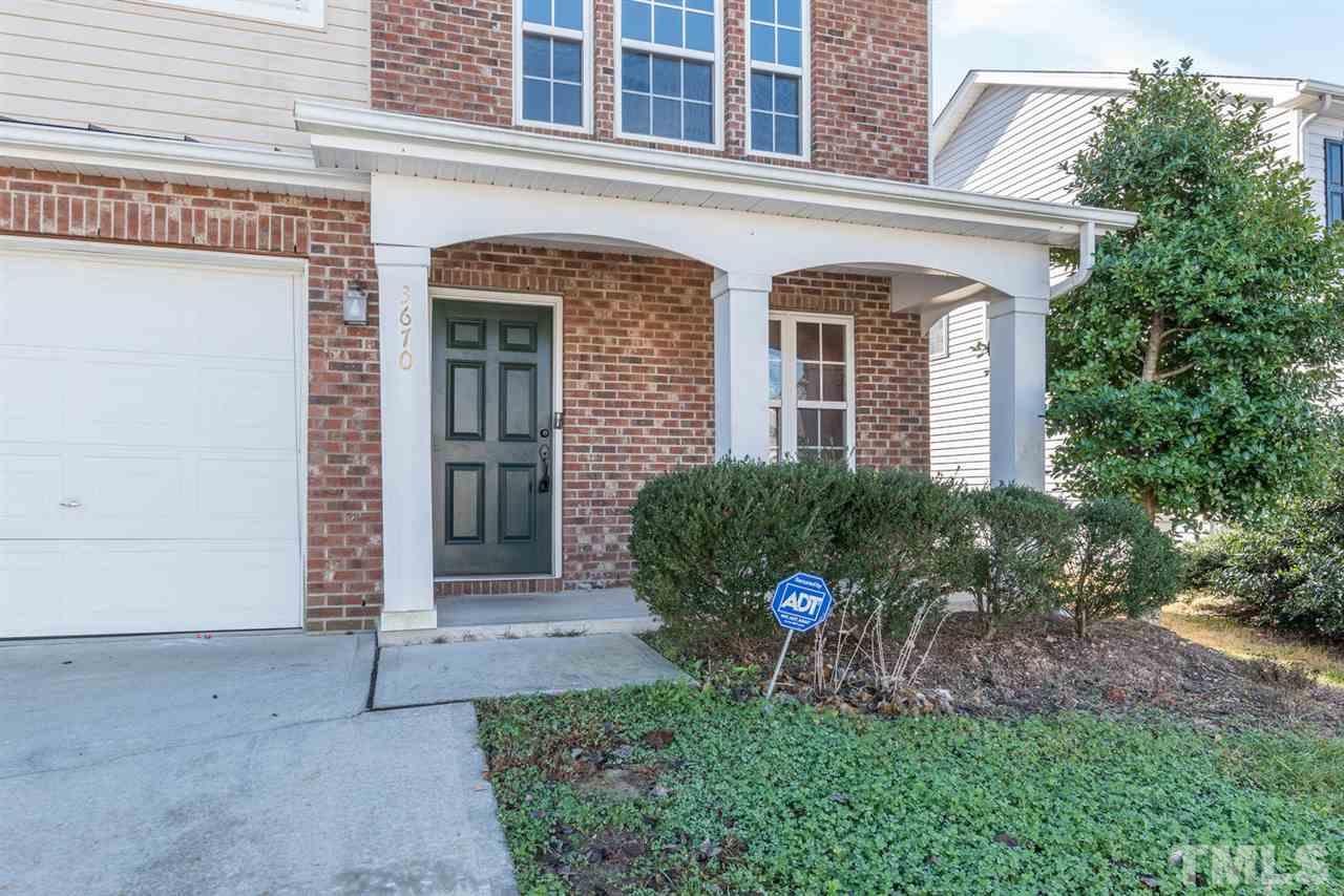3670 Marshlane Way Raleigh, NC 27610 - Photo 2 of 22 a front view of a house with garden