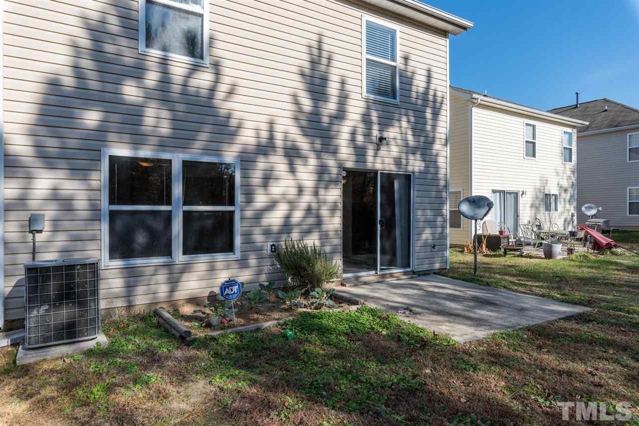 3670 Marshlane Way Raleigh, NC 27610 - Photo 20 of 22 a front view of a house with a yard