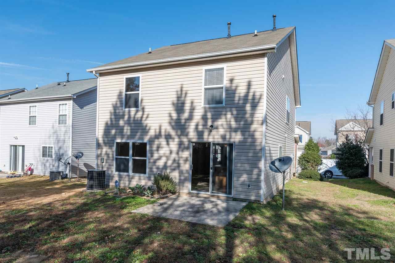 3670 Marshlane Way Raleigh, NC 27610 - Photo 21 of 22 a front view of a house with a yard