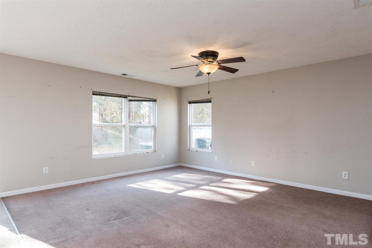 3670 Marshlane Way Raleigh, NC 27610 - Photo 8 of 22 a view of empty room with a window