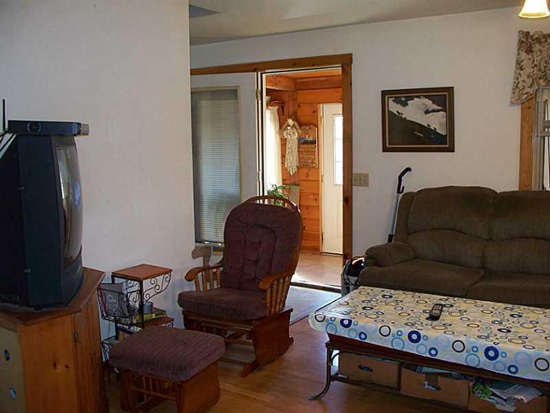 305 East Shore Road Embden, ME 04958 - Photo 11 of 35 Living Room.