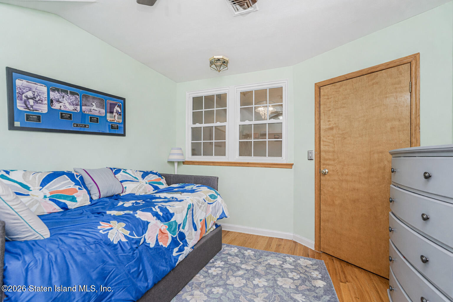 471 Main Street Staten Island, NY 10307 - Photo 24 of 39 a bedroom with a bed and a window