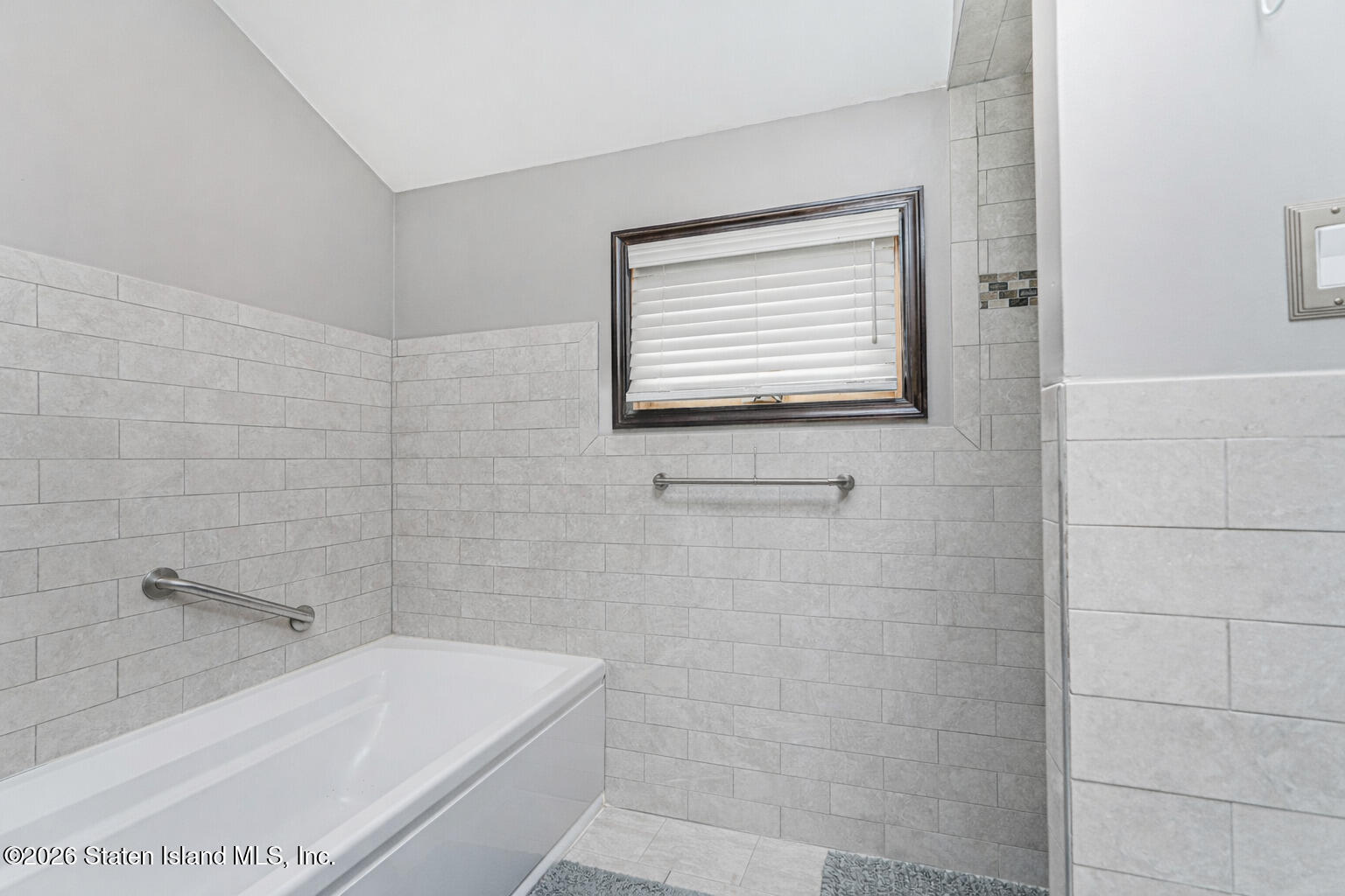 471 Main Street Staten Island, NY 10307 - Photo 27 of 39 a bathroom with a bathtub and shower