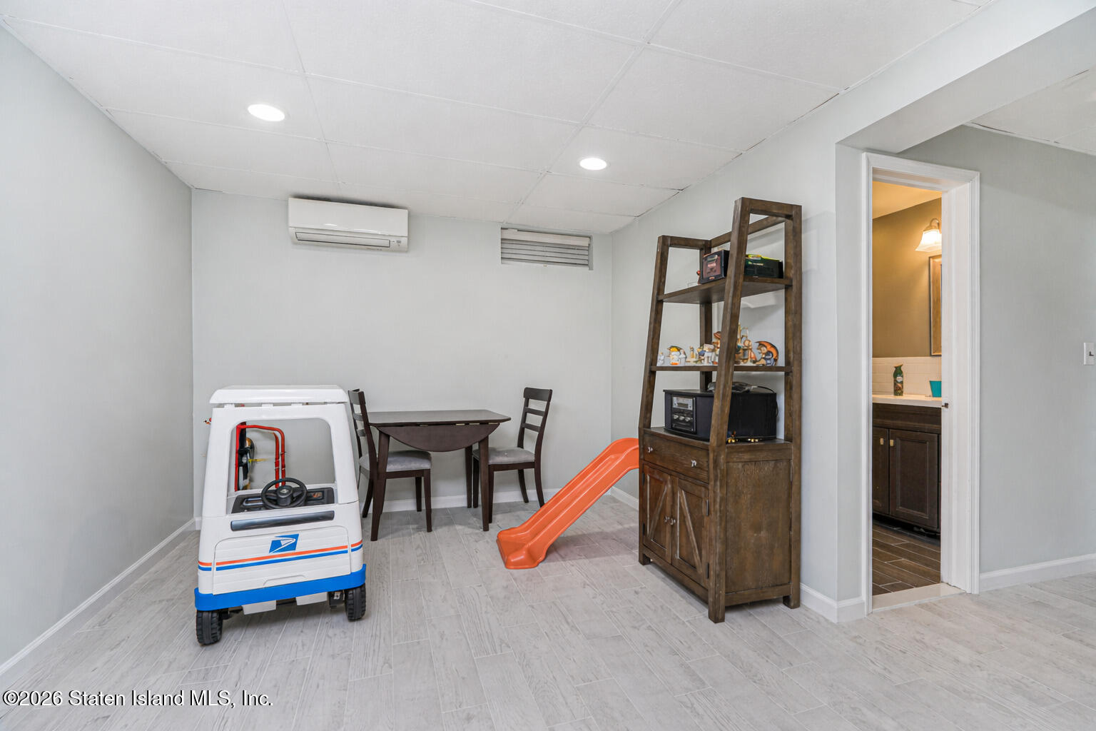 471 Main Street Staten Island, NY 10307 - Photo 28 of 39 a living room with furniture and a table