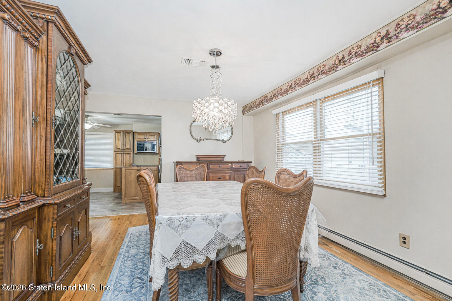 471 Main Street Staten Island, NY 10307 - Photo 8 of 39 a view of a dining room with furniture window and wooden floor