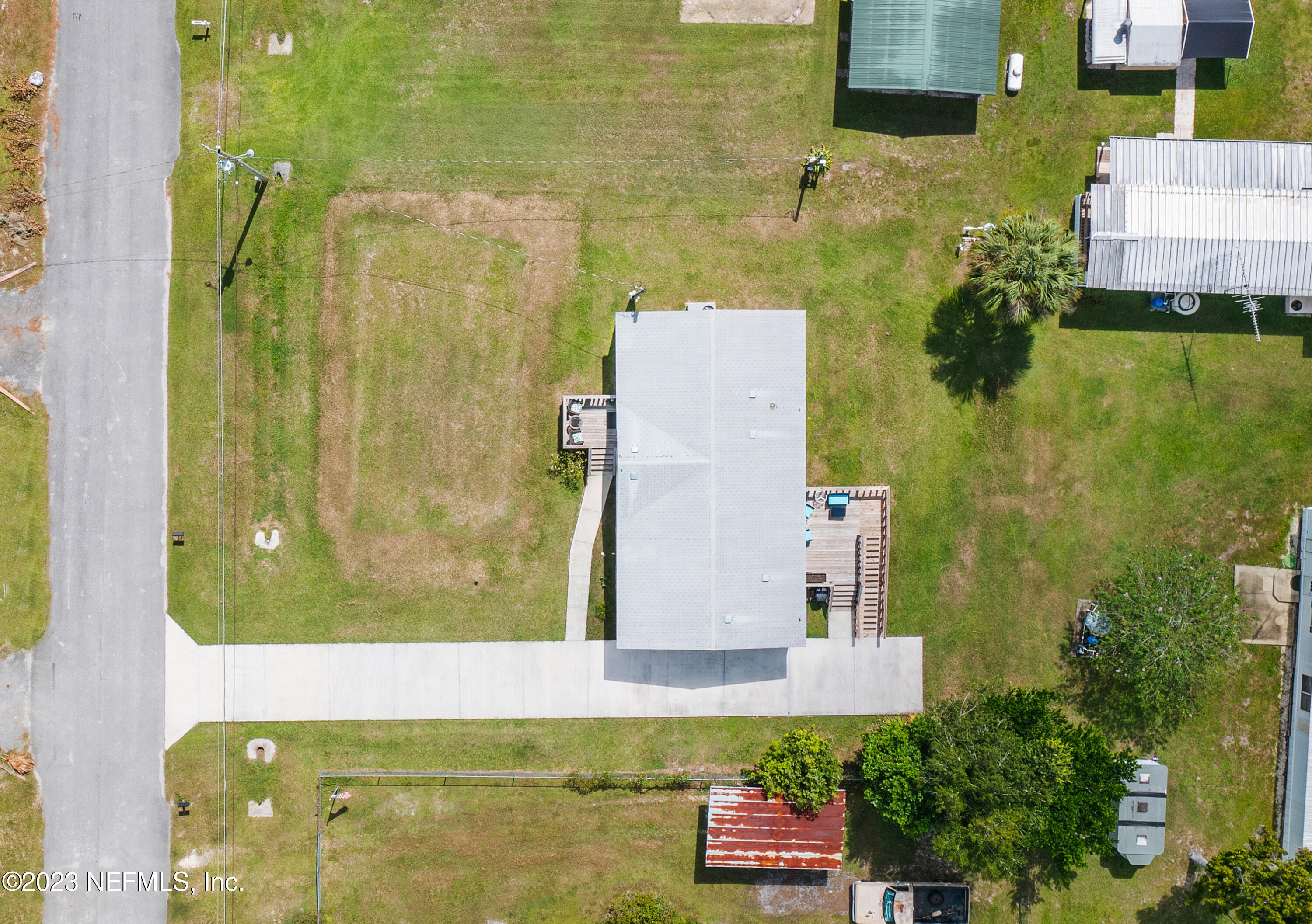 117 Riverside Avenue Satsuma, FL 32189 - Photo 22 of 24 view of rooftop