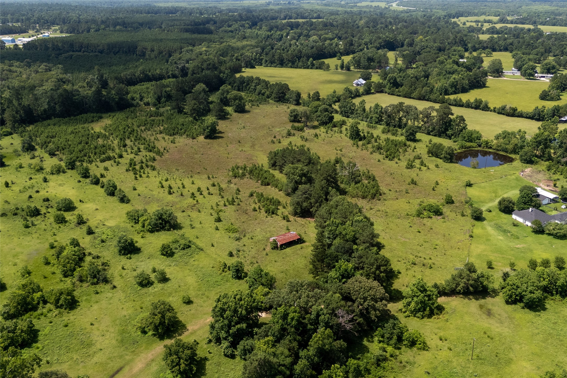 0 R L R L Moffett Street Goodrich, TX 77335 - Photo 6 of 17 an aerial view of residential house with green space